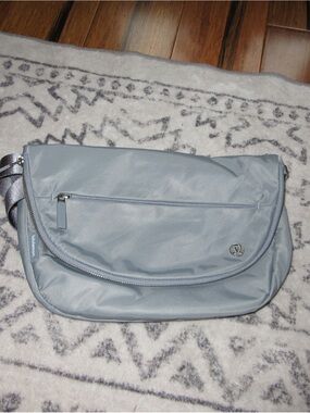 Lululemon All Night Festival Light Gray Crossbody Bag with Front Zip Pocket